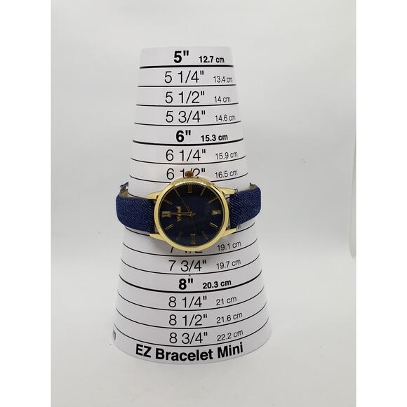 Vivani WAC5341KL 0520. Blue face with gold accents, denim blue band.